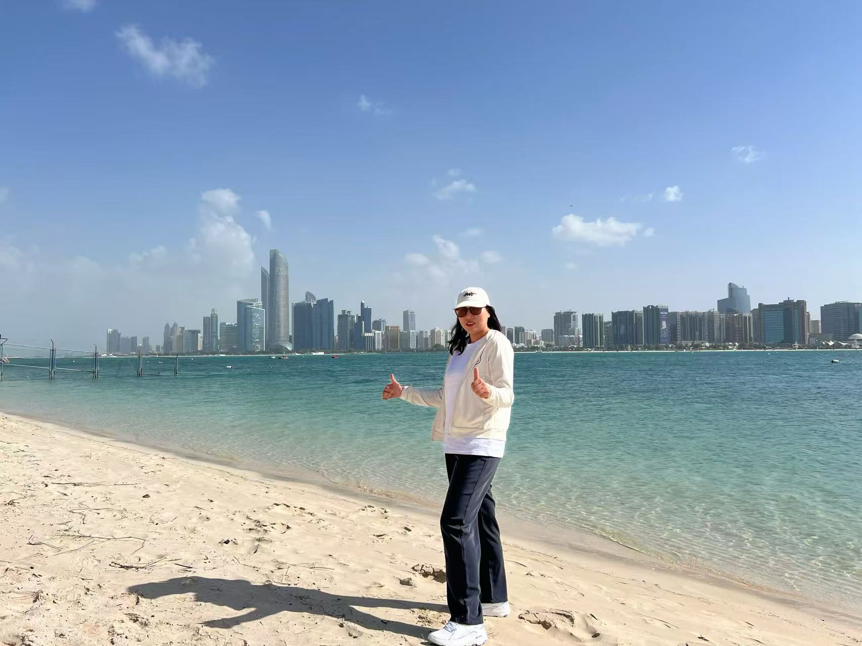 Lisa Yu, founder of Zheyue Trading, by the seaside